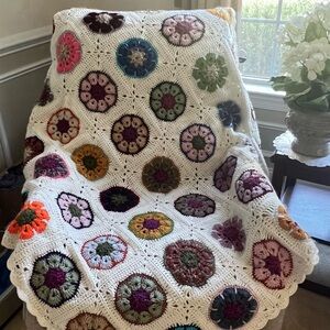Vintage crocheted granny square blanket